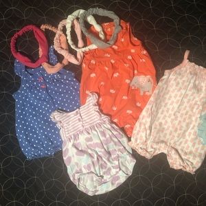 4 New Born baby girl jump suits.